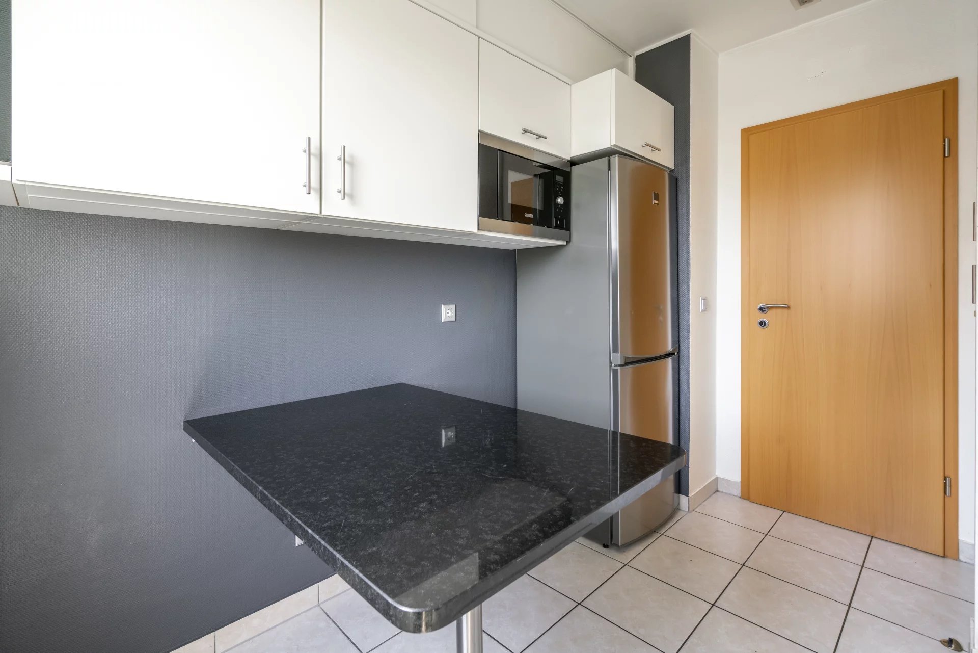 Apartamento luminoso no último andar com garagem privativa