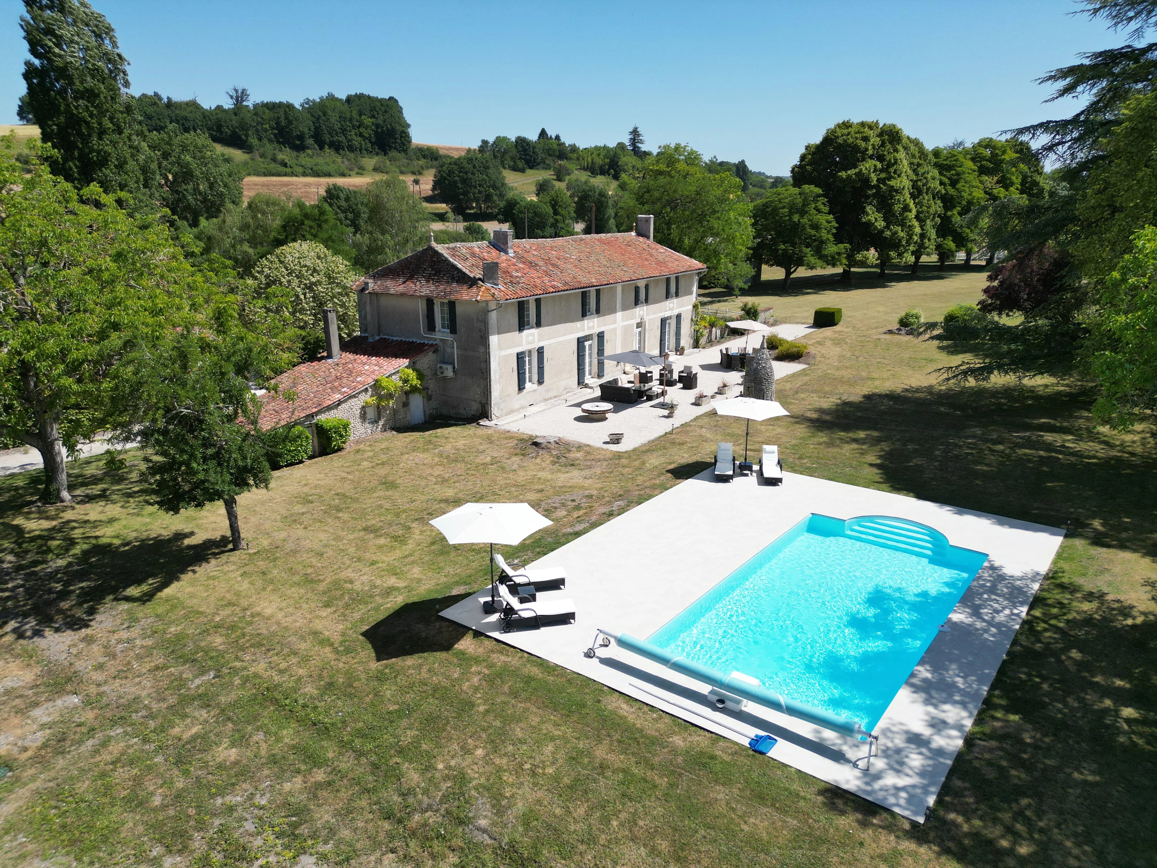 Stunning 5-bed property with pool, outbuildings in glorious grounds
