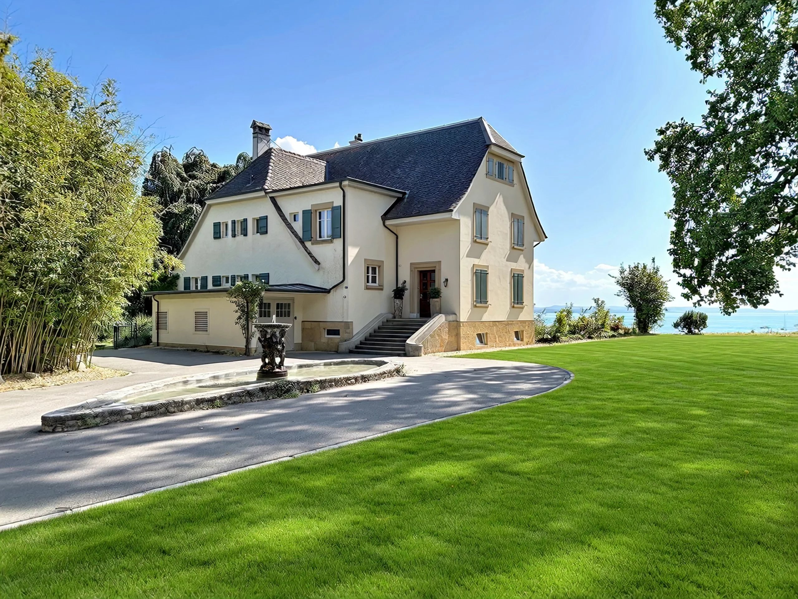 Maison de maître pieds dans l'eau