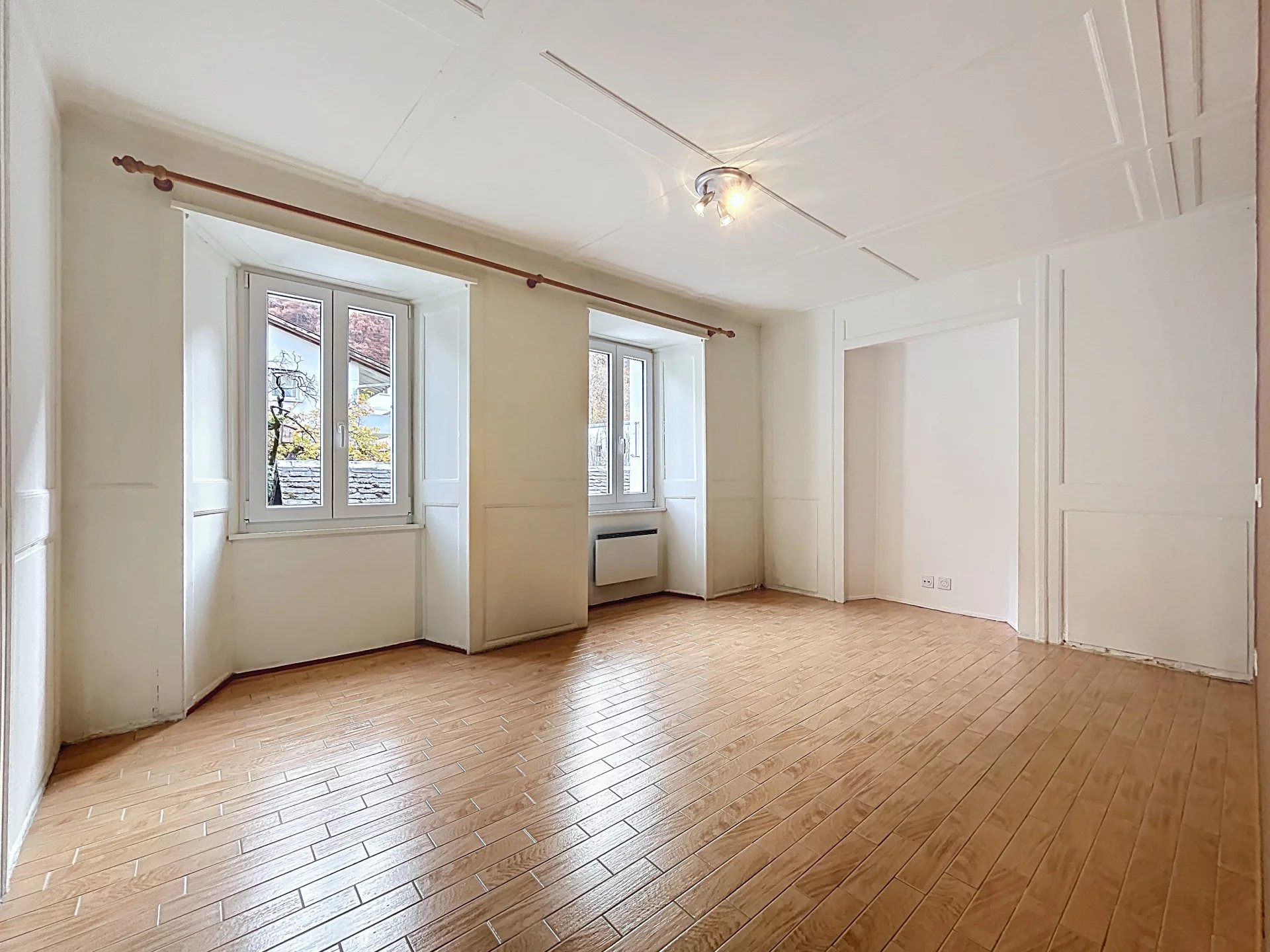 Appartement en rez-de-chaussée surélevé avec jardin