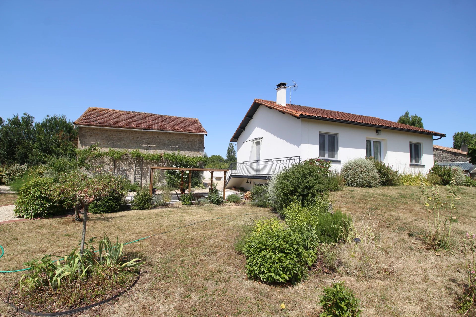 Detached edge of village house with three bedrooms, barn and garden