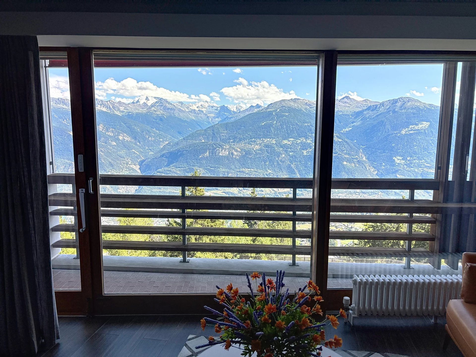Deux magnifiques appartements de standing reliés avec une avec une vue panoramique sur les Alpes