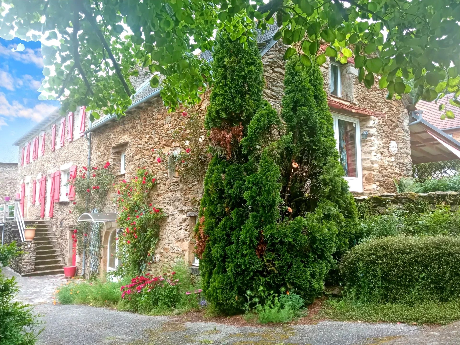 Charming Stone Estate with Private Lake, Indoor Pool, and Rental Potential