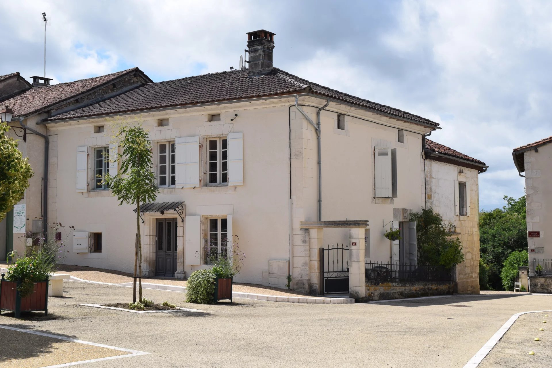 Village house with attached house, barns and gardens