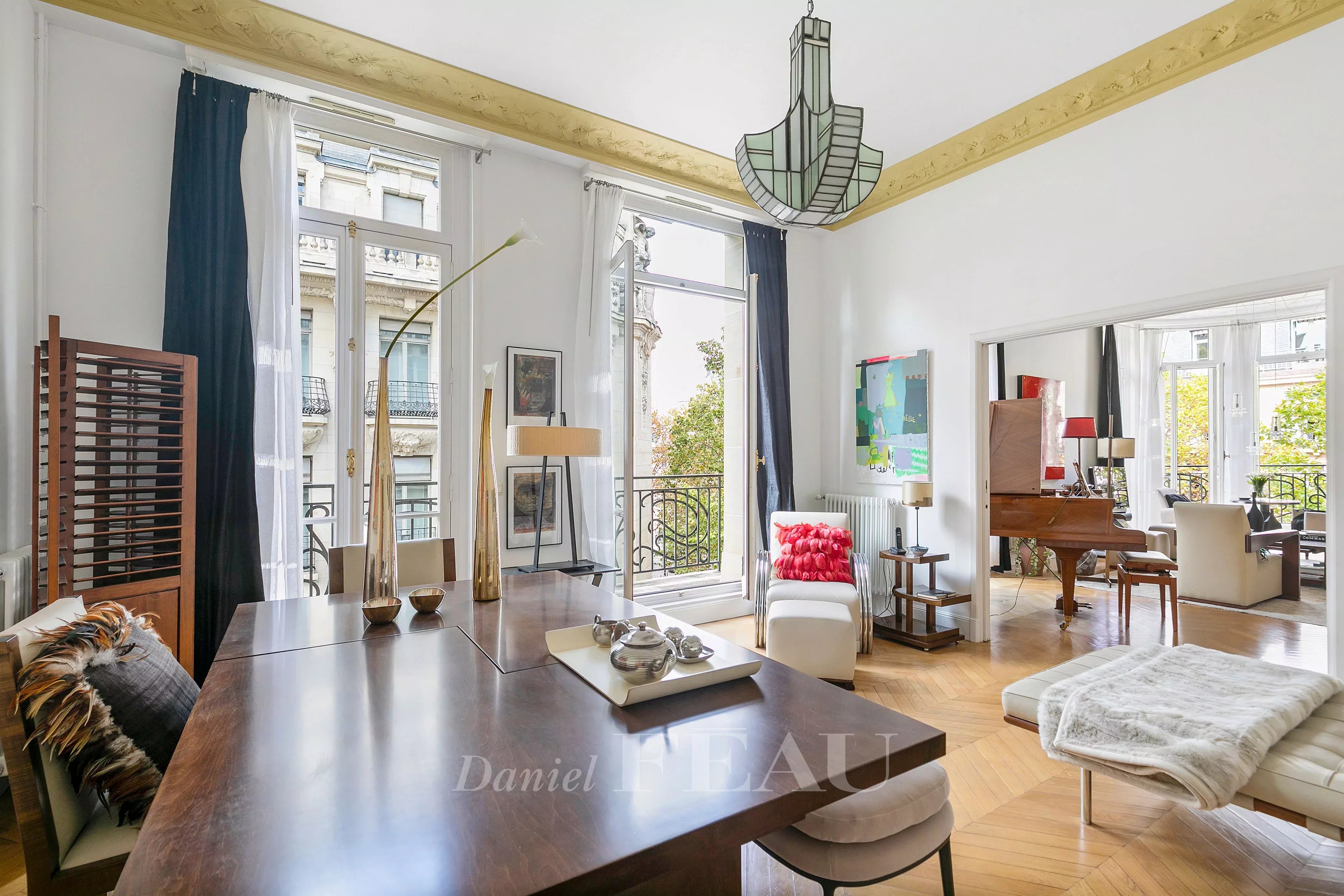 Dining room and living room, herringbone parquet flooring, mouldings, high ceiling