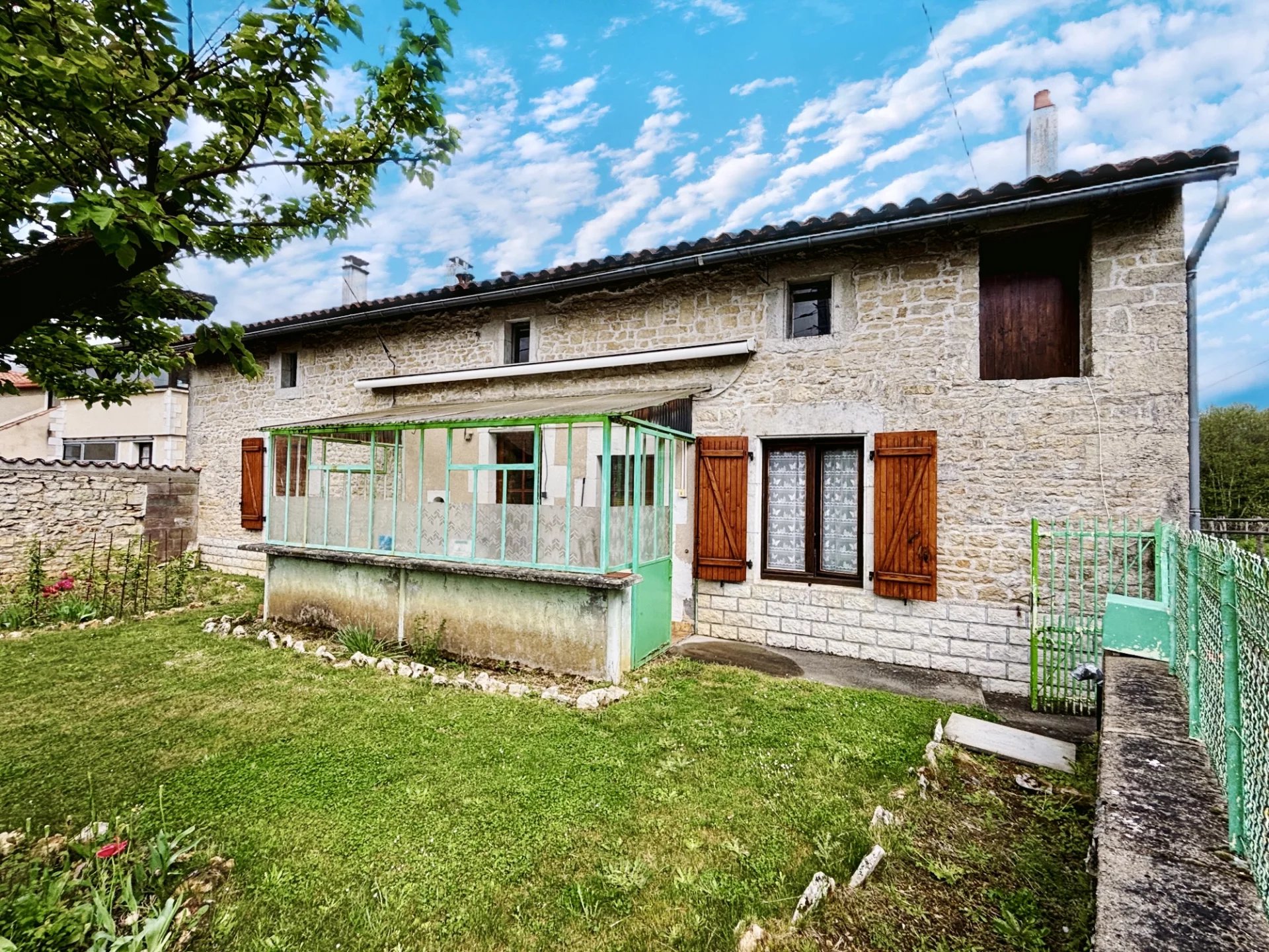Stone character home with a large garden and outbuildings