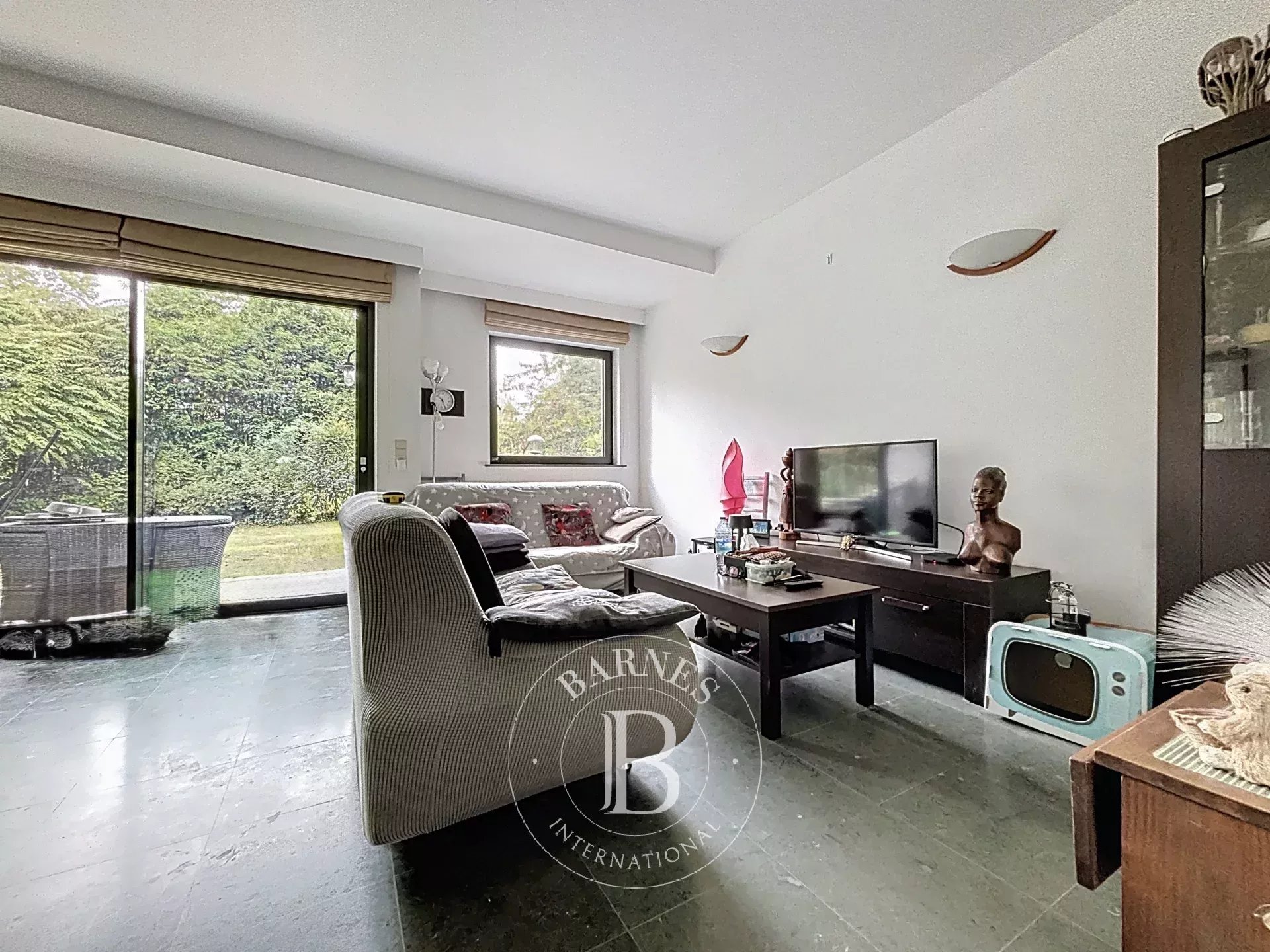 Appartement 1 chambre avec beau jardin + box fermé