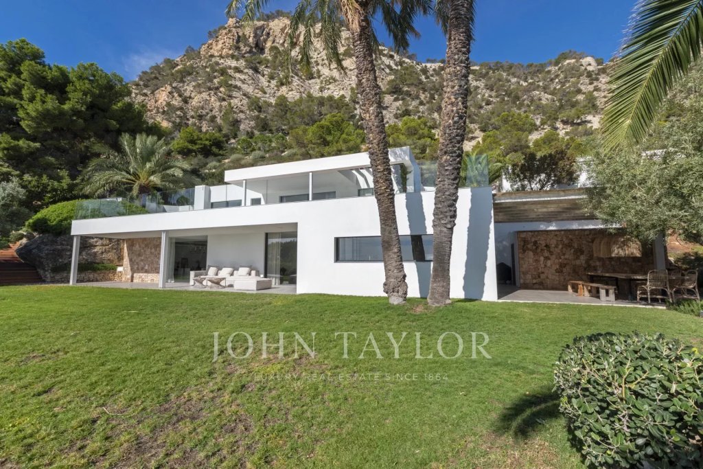Villa for sale in Es Cubells — Luxury Villa Es Cubells: Seafront Family Estate with Private Cove