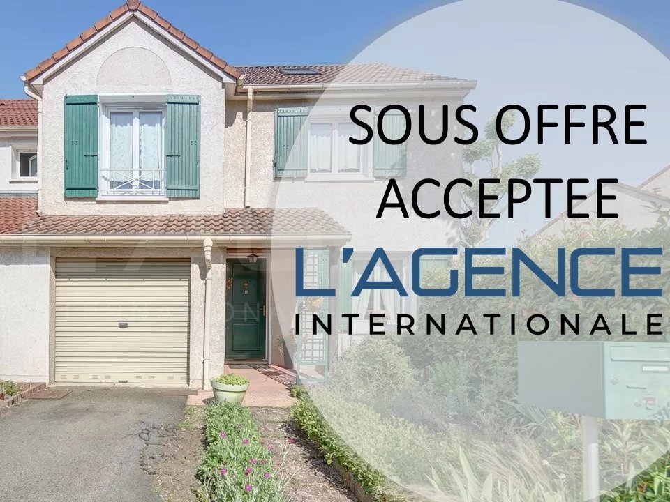 Maison jumelée d'un coté avec jardin