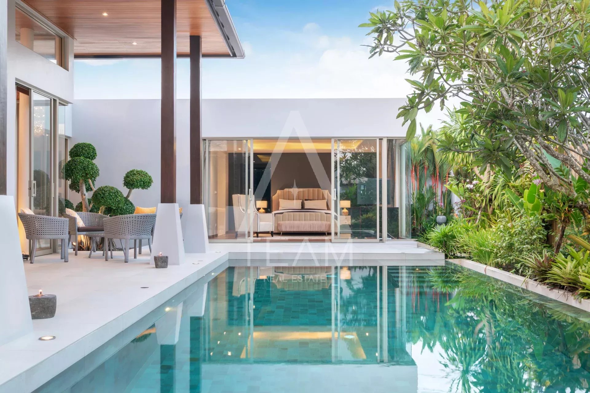 deck,building,beautiful,view,white,towel,duck,property,sun bed,sky,night,estate,pool,real,greenery,contemporary,background,style,colorful,concept,exterior,house,sea,summer,interior,swimming,modern,des