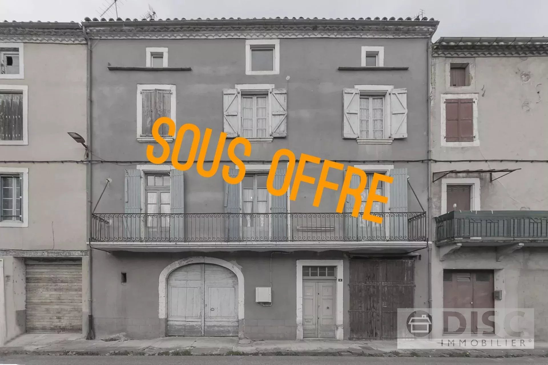 Spacious building with two garages and independent apartment.