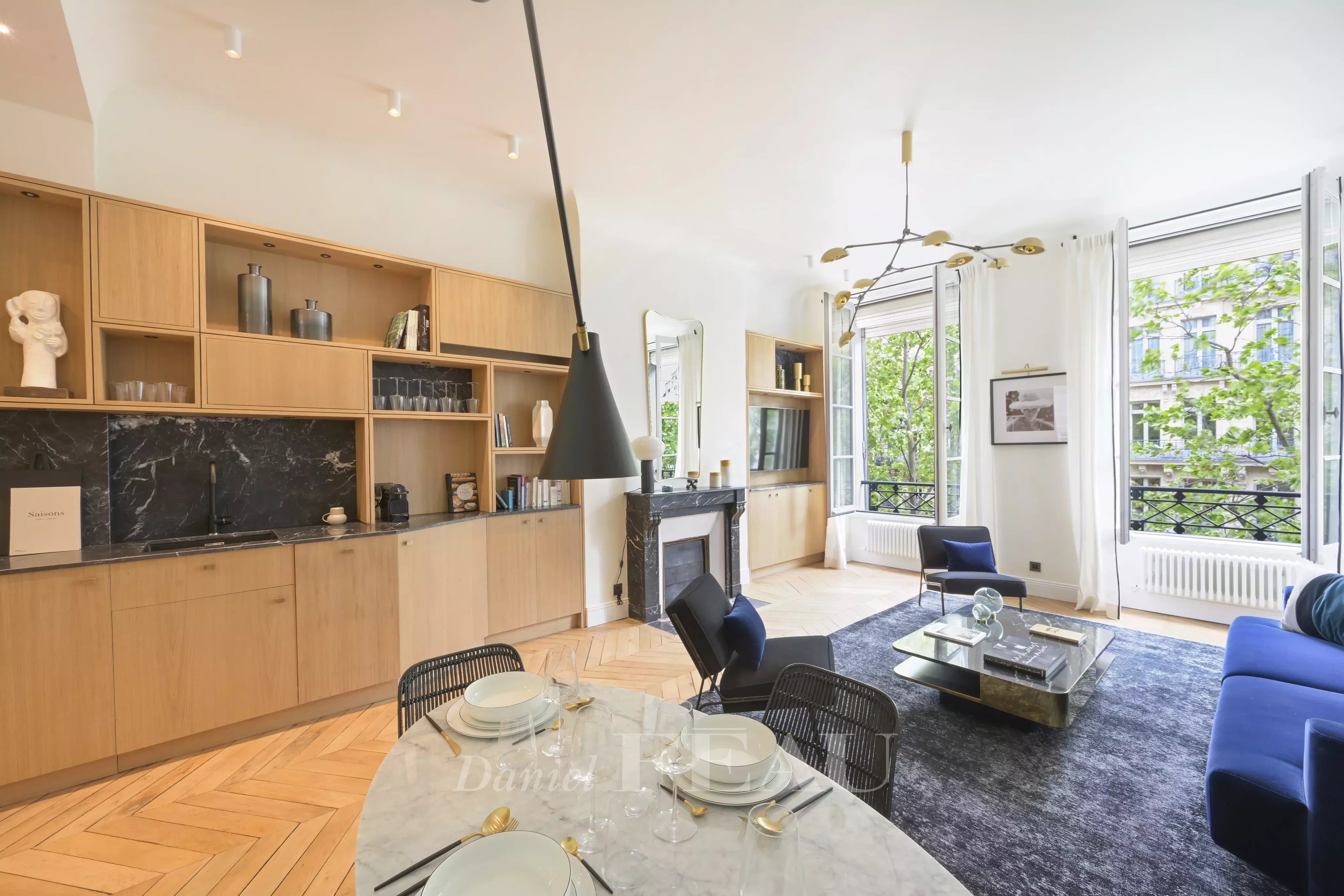 Living room with open kitchen, fireplace