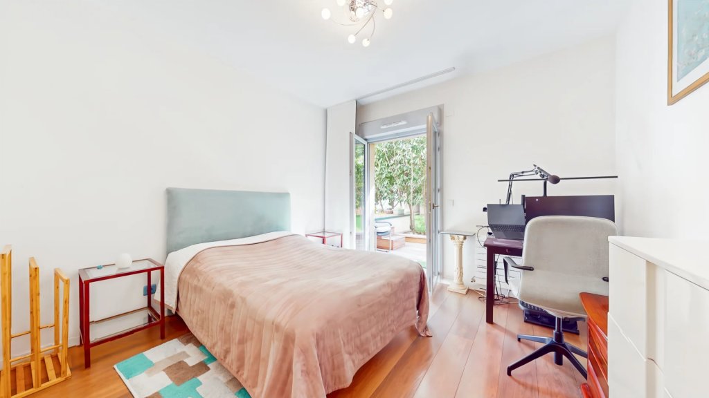 Chambre avec vue sur le jardin