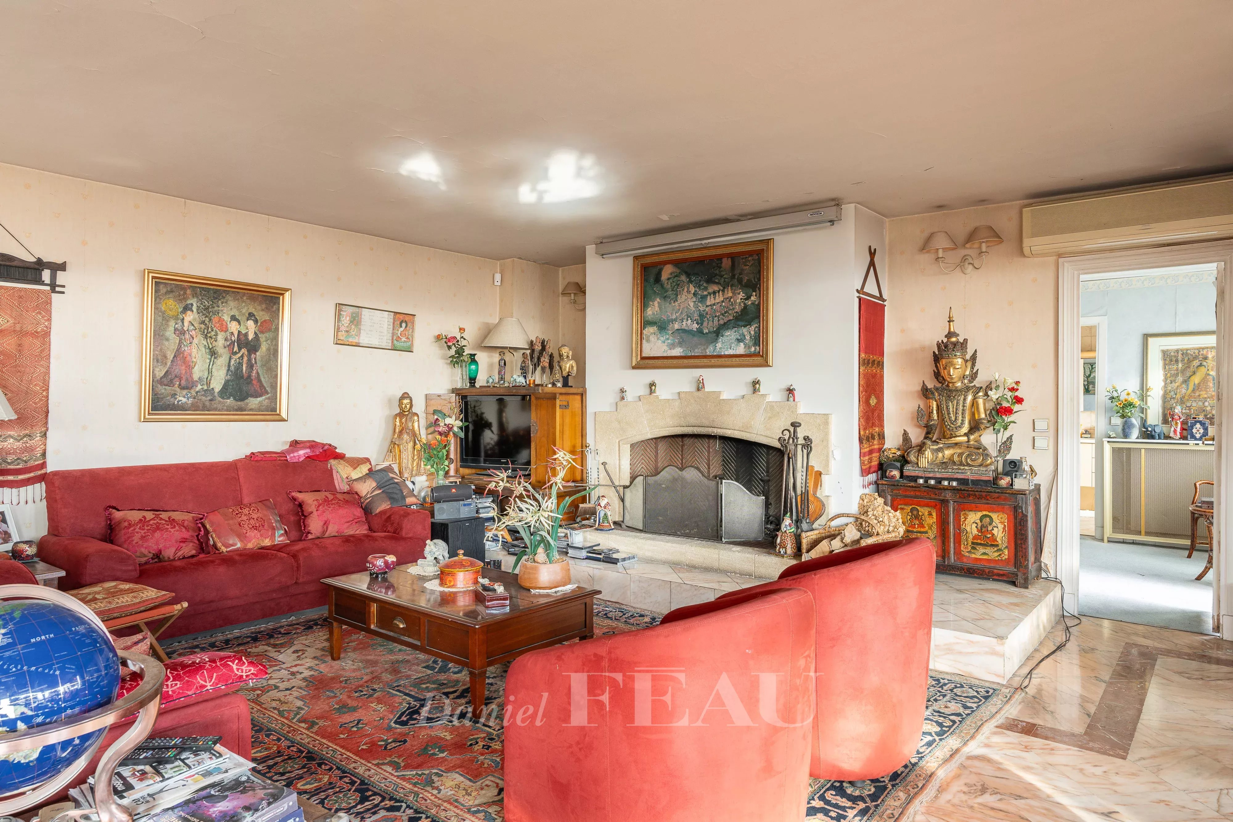 Salon cheminée véranda