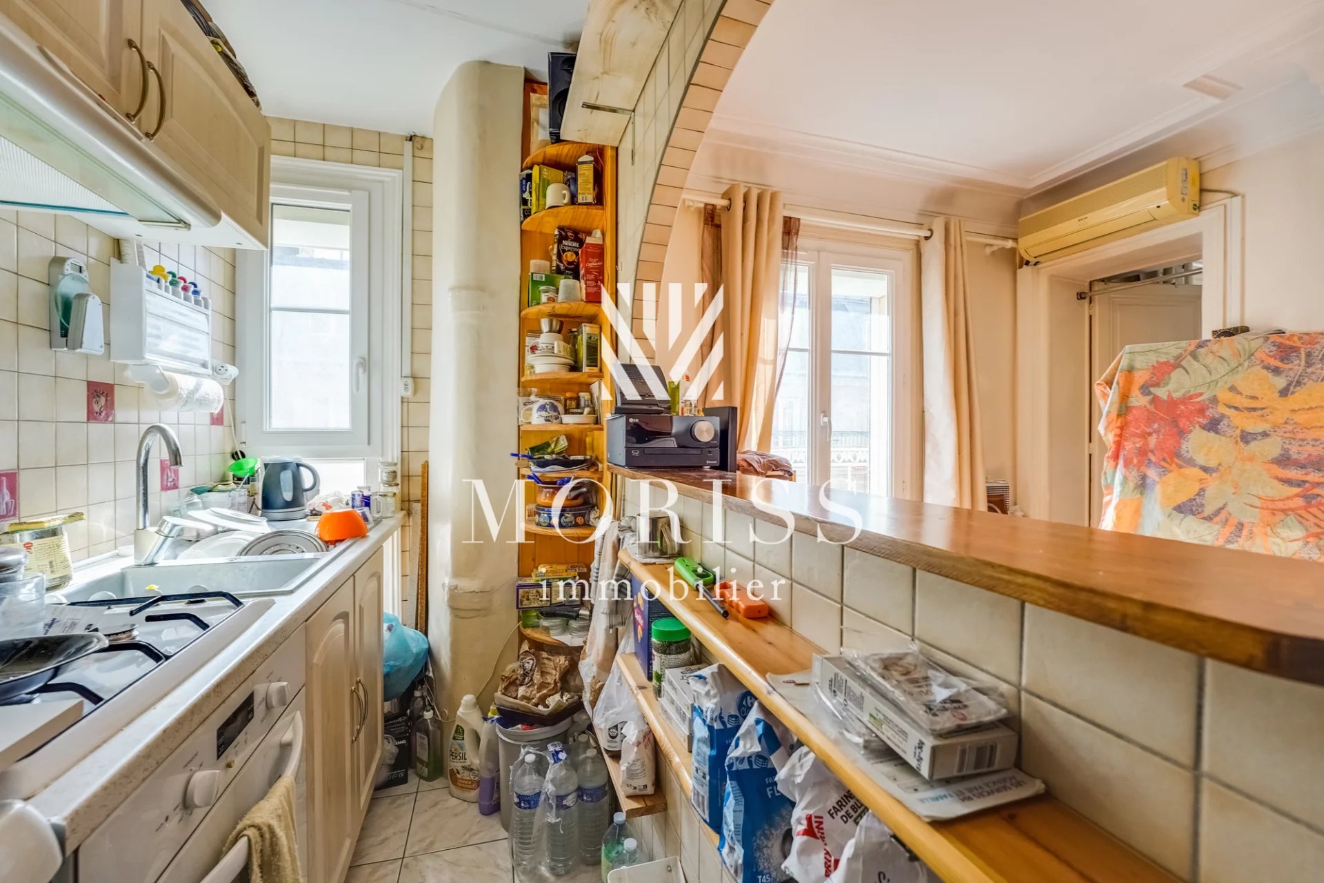 PARIS 18e — 2 PIÈCES — BALCON FILANT — ÉTAGE ÉLEVÉ - Image Array