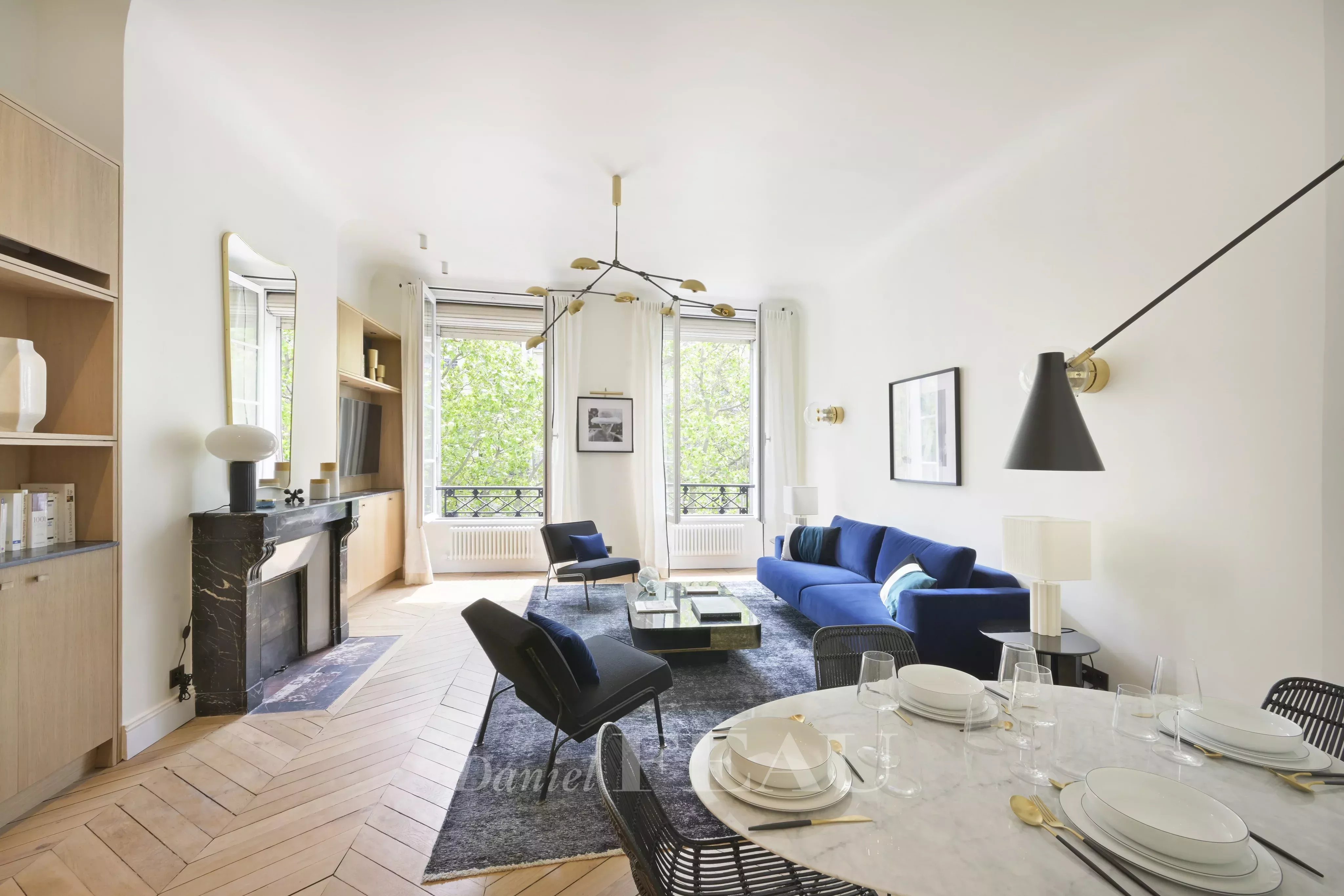 Living room with open kitchen, fireplace