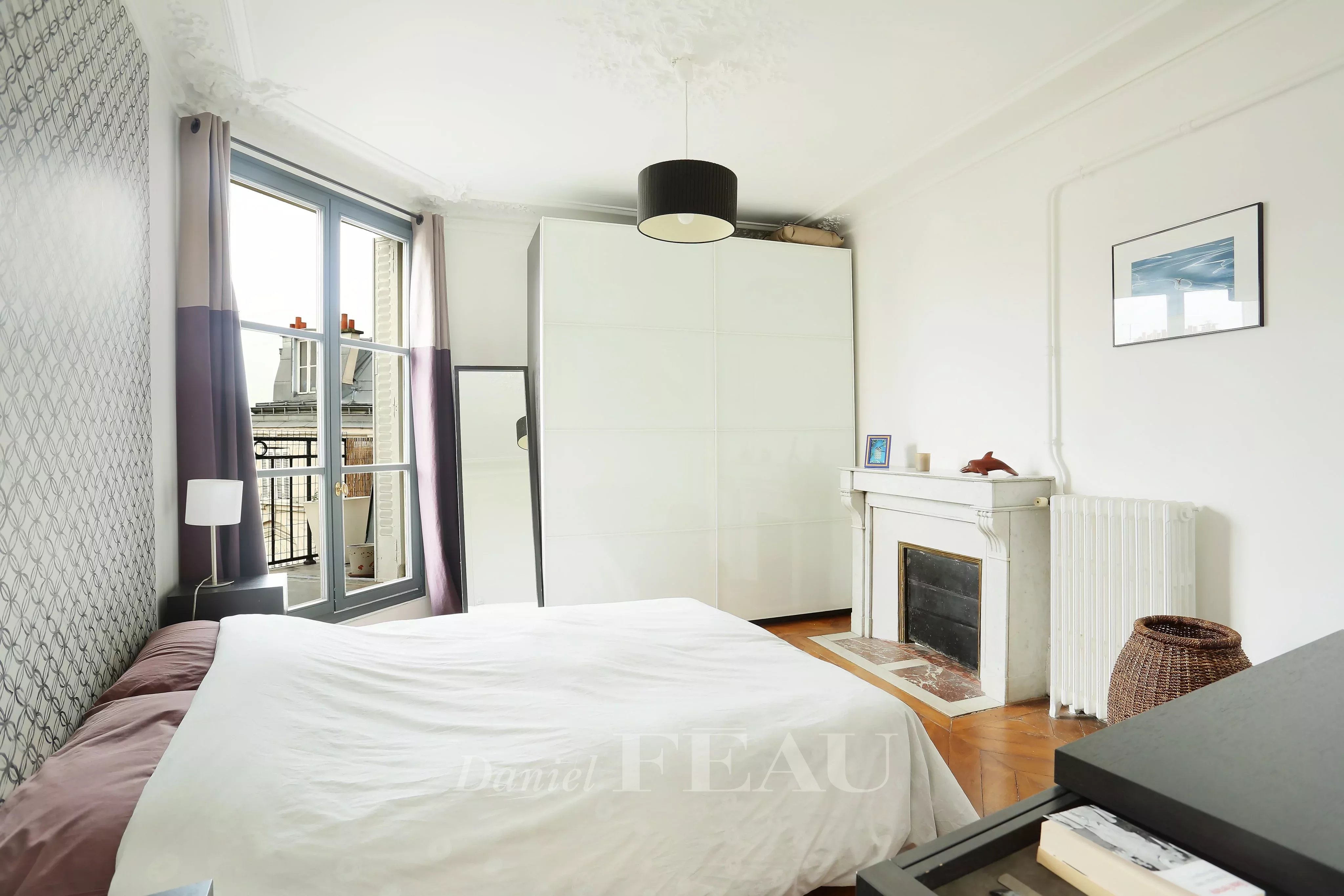 Bedroom Natural light Fireplace Wooden floor