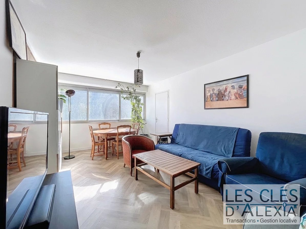 Appartement T4 traversant et lumineux de 82 m² avec balcon, garage et cave – Résidence sécurisée avec ascenseur