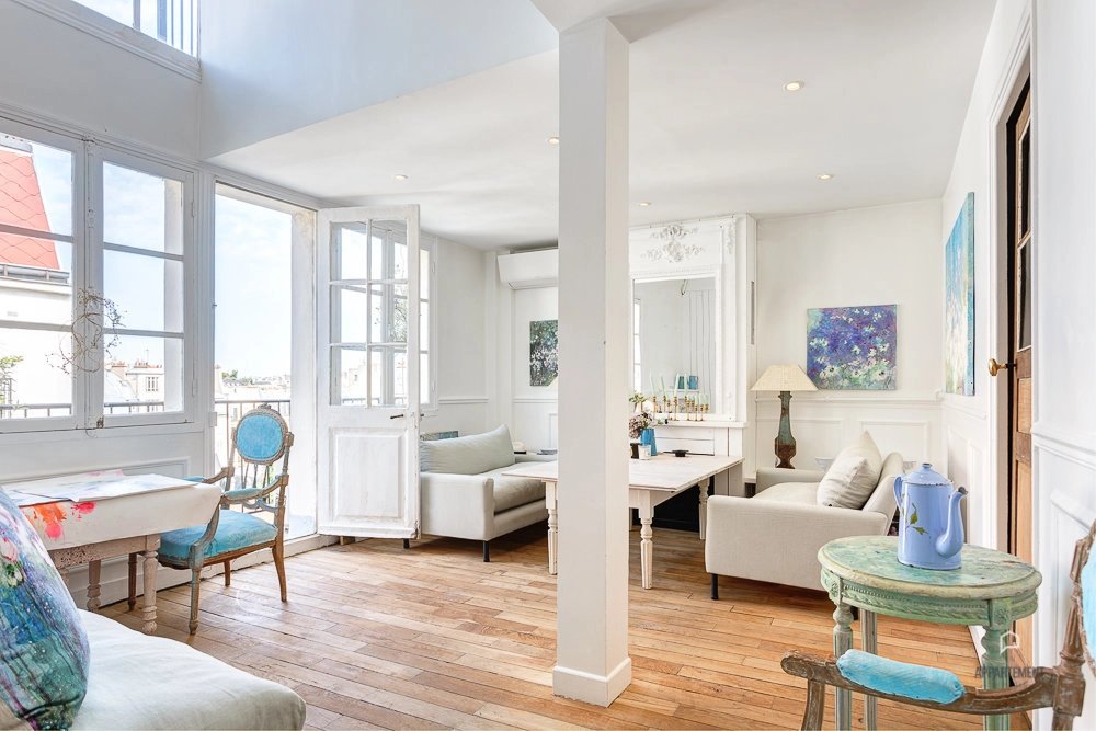 Agence immobilière de Un Appartement À Paris