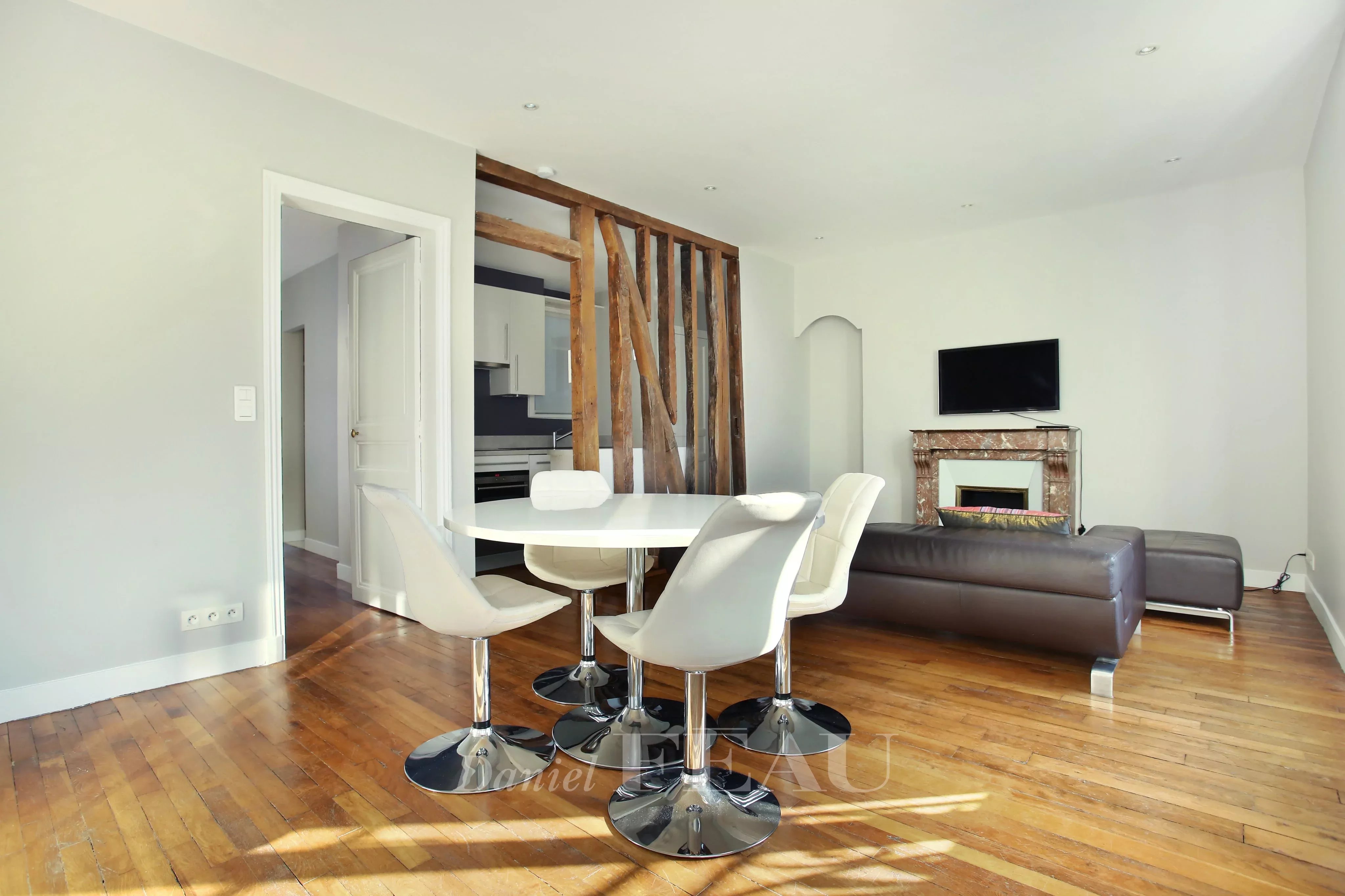 Dining room Wooden floor Fireplace