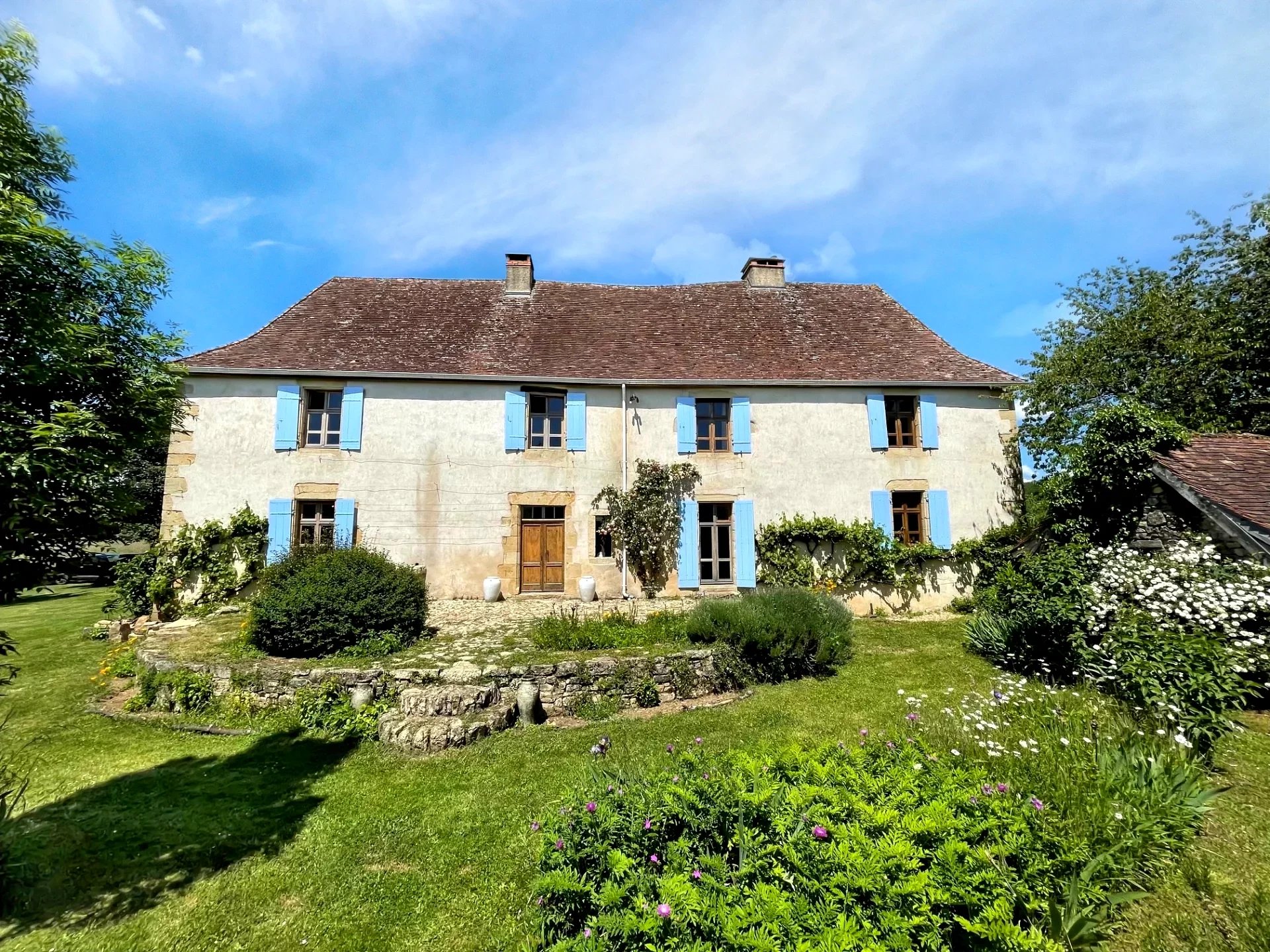 Beautiful manor house with outbuildings and land