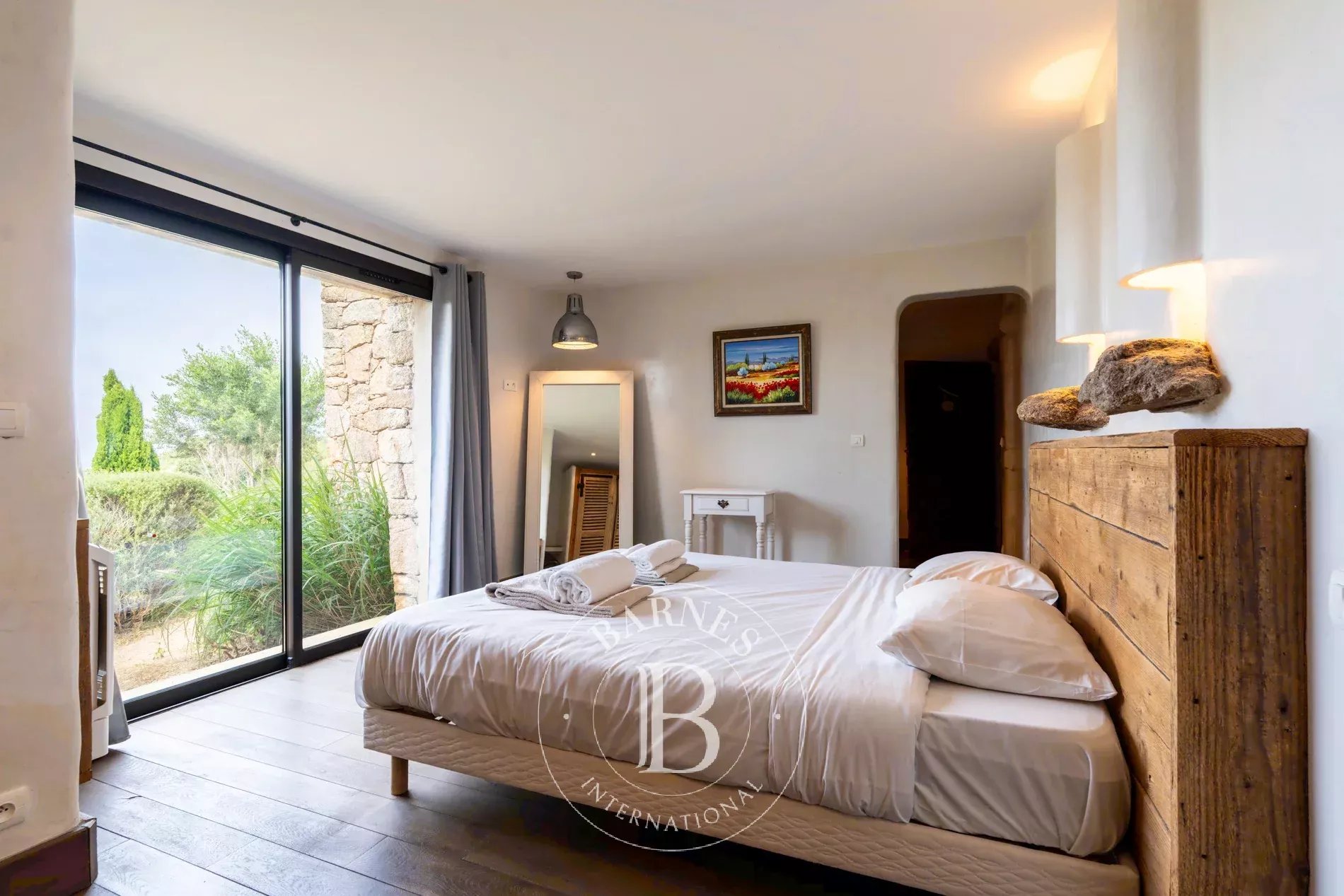 Exclusive listing – Bonifacio. Architect-designed villa in the style of a bergerie, featuring 4 bedrooms, a swimming pool, sea and mountain views, and close proximity to the beach. - picture 24 title=