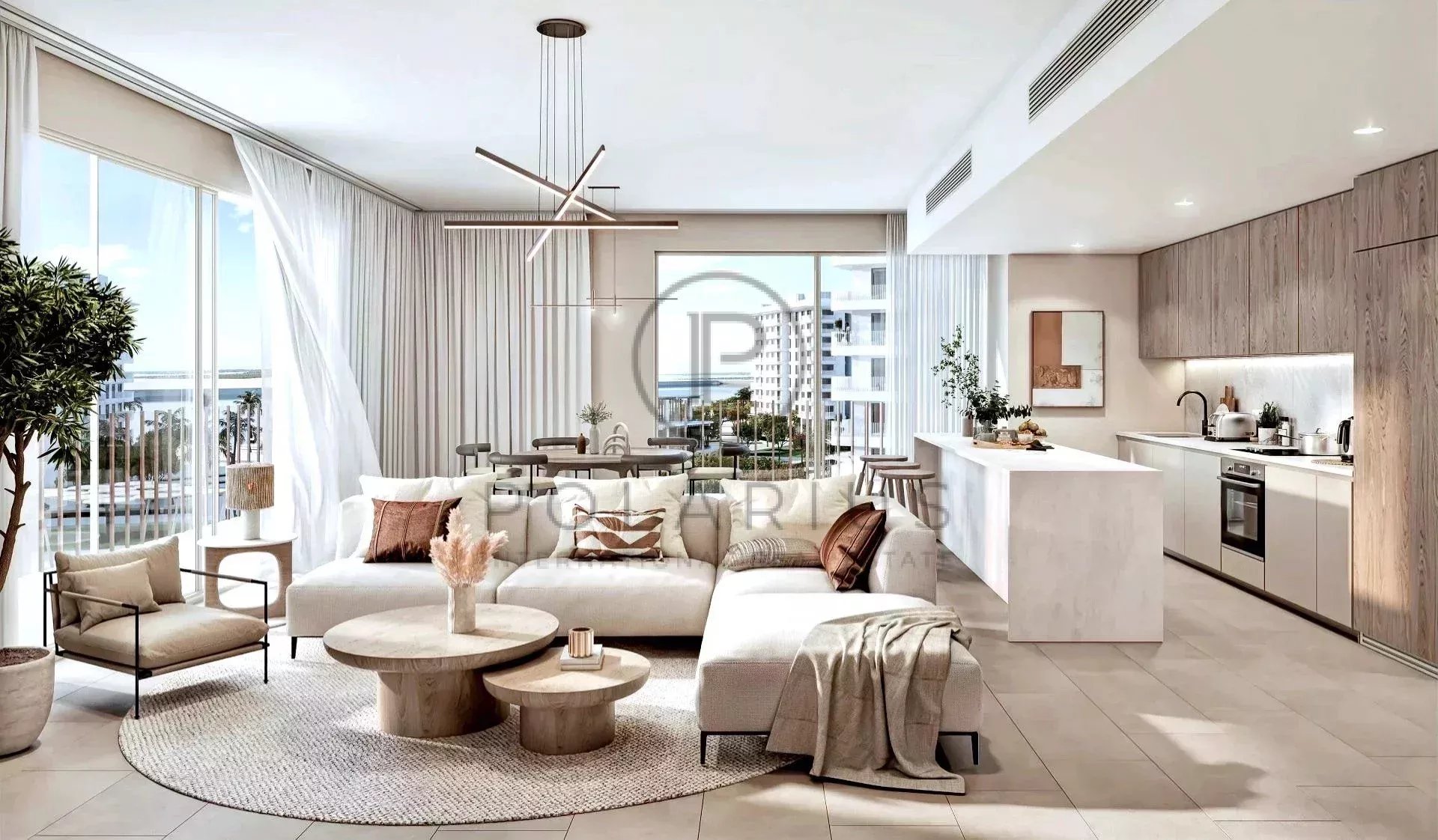 Ein modernes, helles Wohnzimmer mit offener Küche, stilvoll eingerichtet mit großen Fenstern und einer gemütlichen Sitzgruppe.