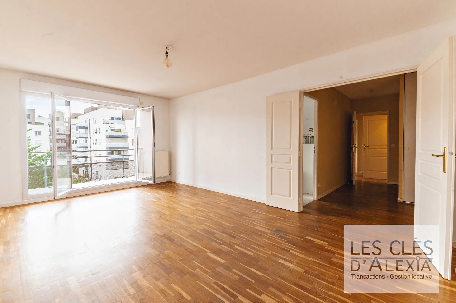 Beau T3 - 64,58 m² à Villeurbanne, avec terrasse de 10 m² et garage box en sus