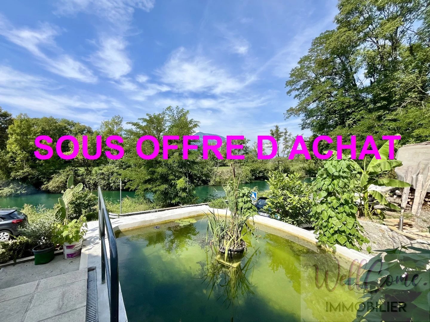 CHANAZ vue sur le canal, bâtisse rénovée avec plusieurs logements et annexes