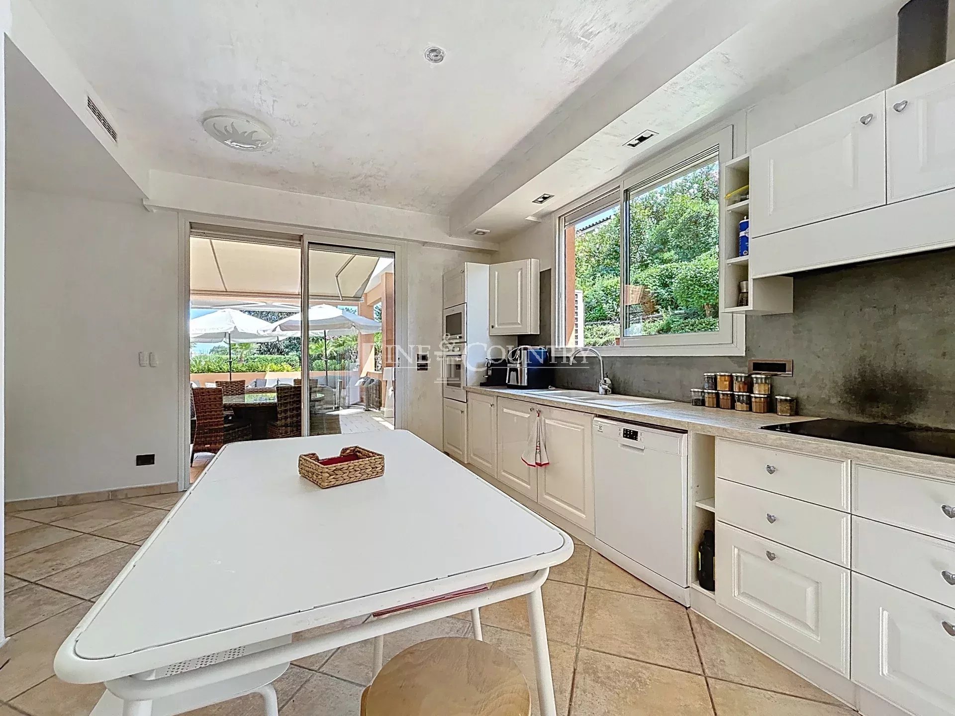 Photo of Villa for sale in Mandelieu in private domain with partial sea view