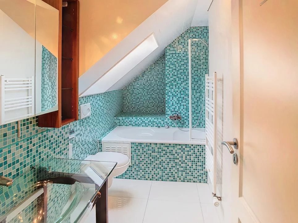 Duplex en attique avec terrasse au centre-ville