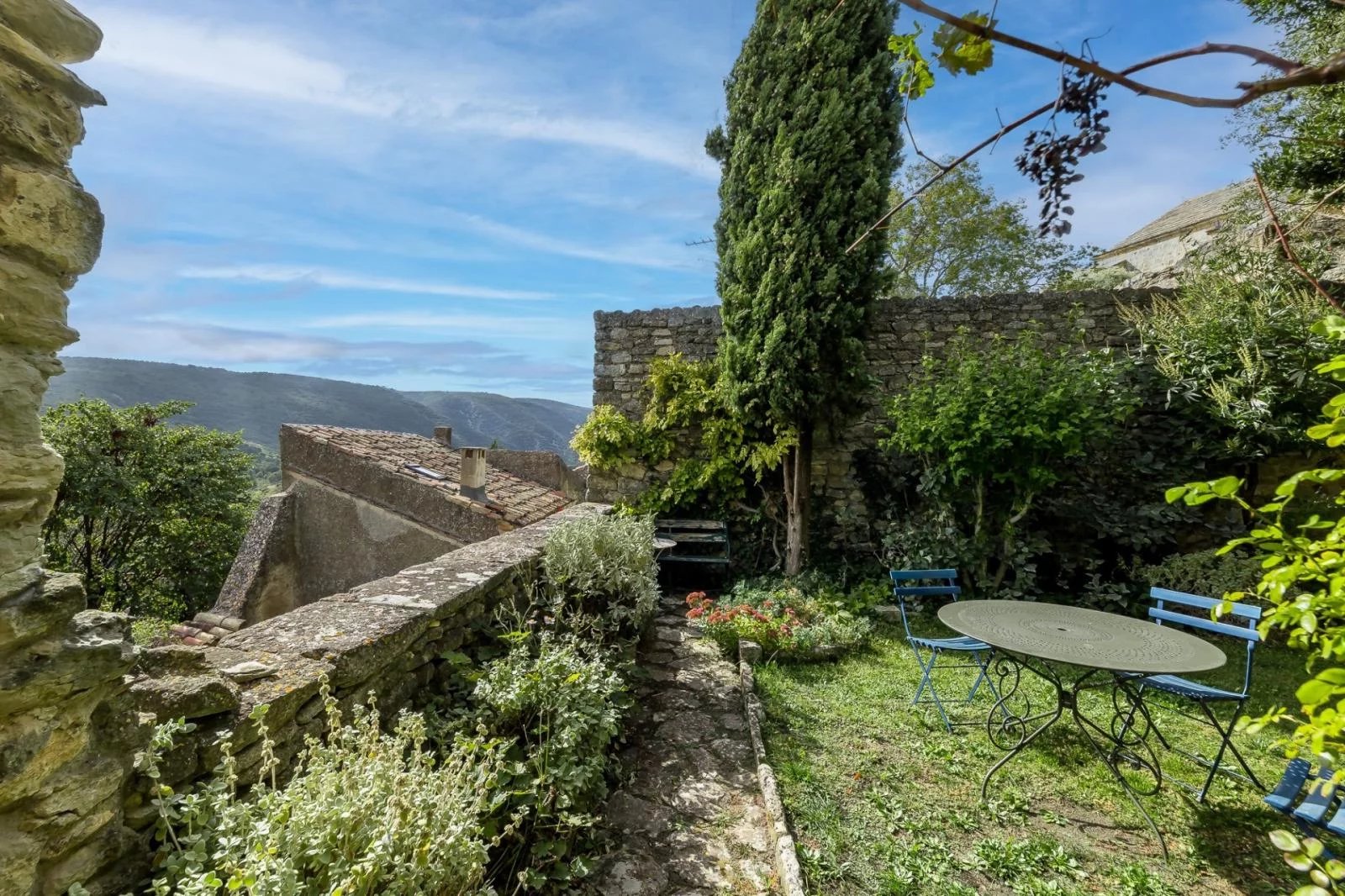 Exceptional village house with garden and view