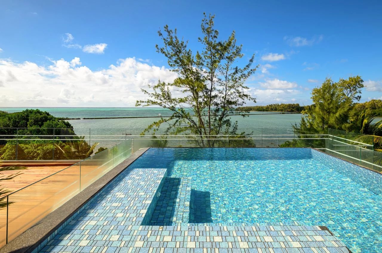 Exceptional 4-Bedroom Penthouse with Panoramic Lagoon Views at Azuri Golf & Beachfront Village
