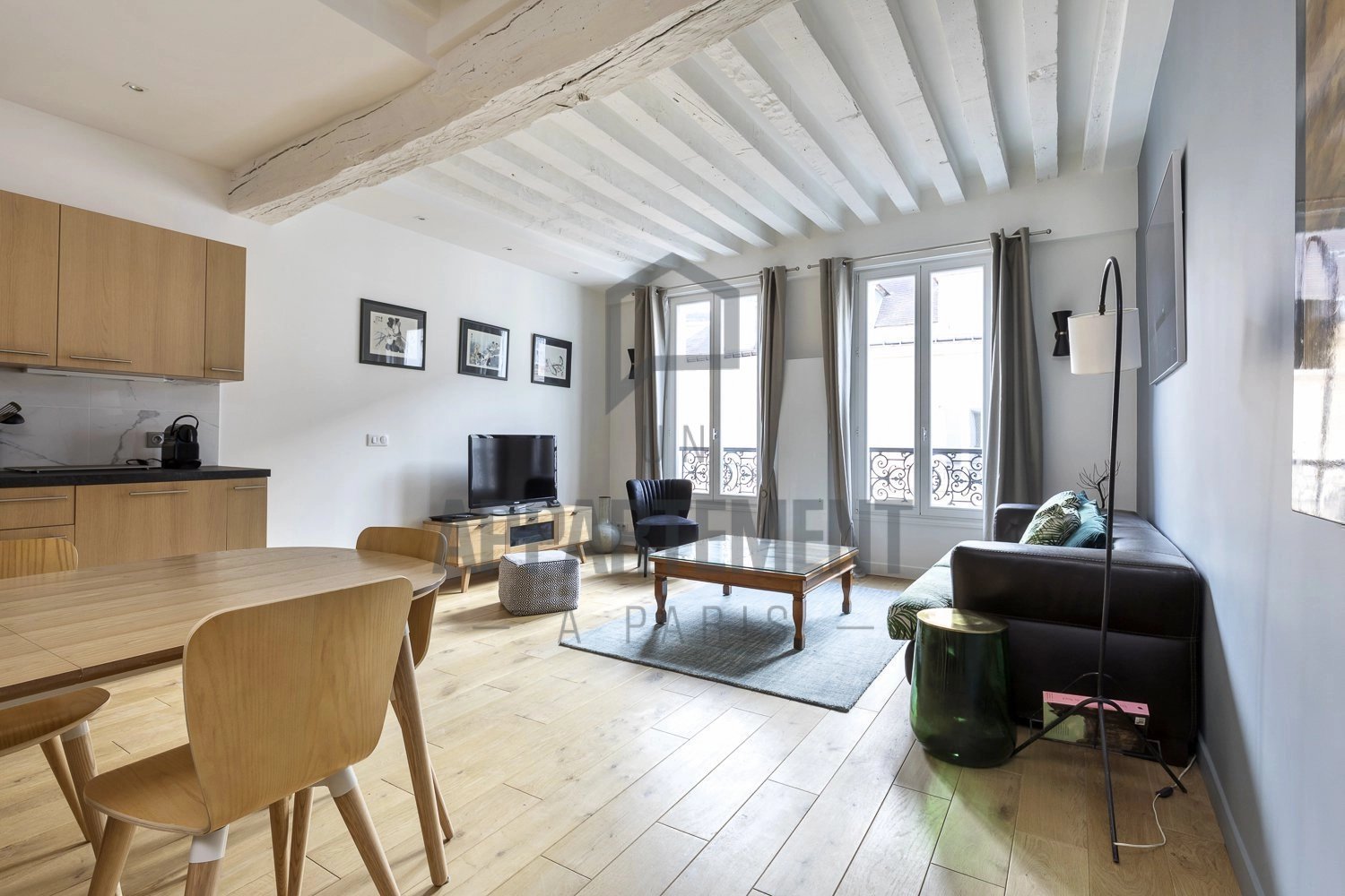 Agence immobilière de Un Appartement À Paris