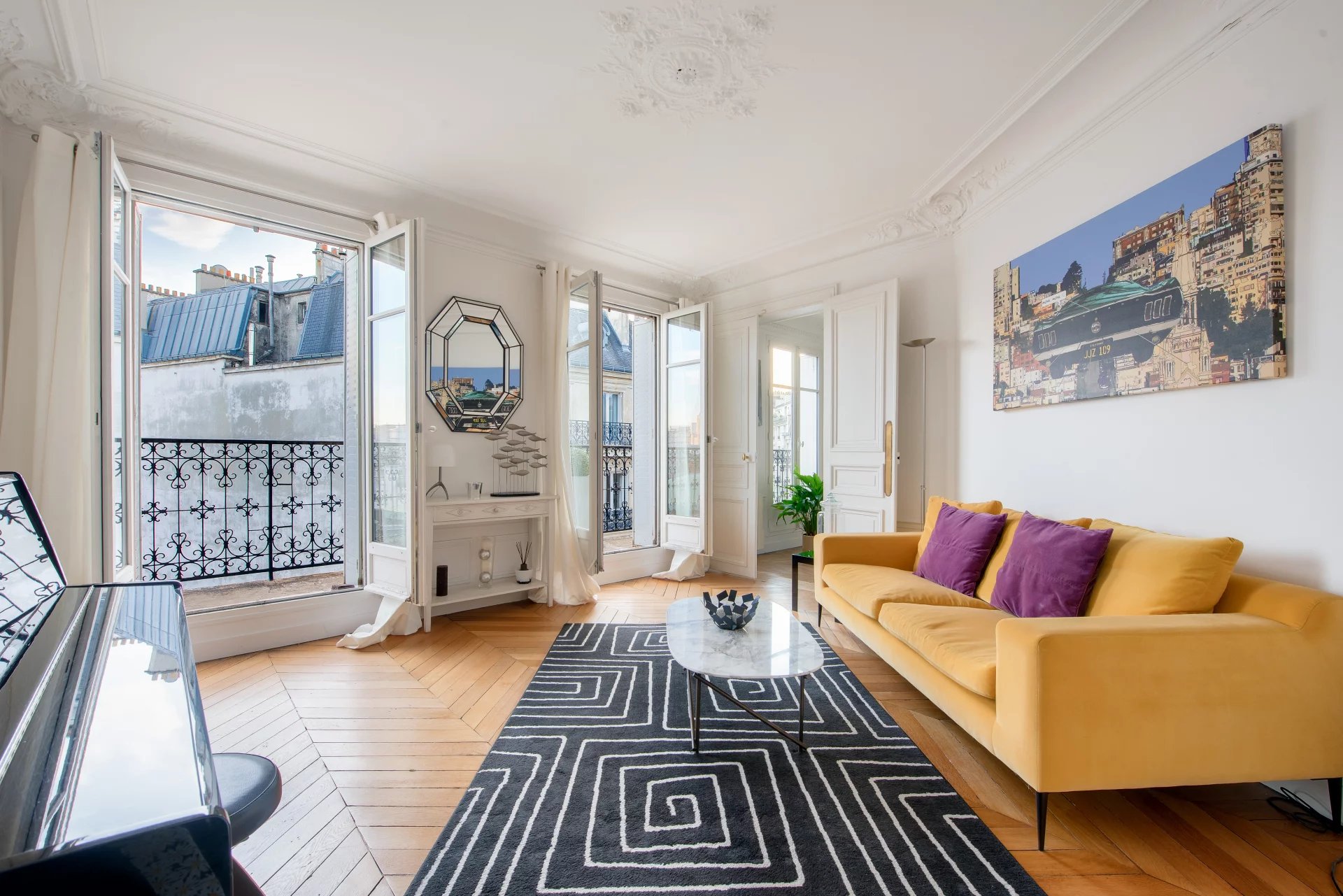 High floor apartment with balcony and unobstructed view of the Eiffel Tower