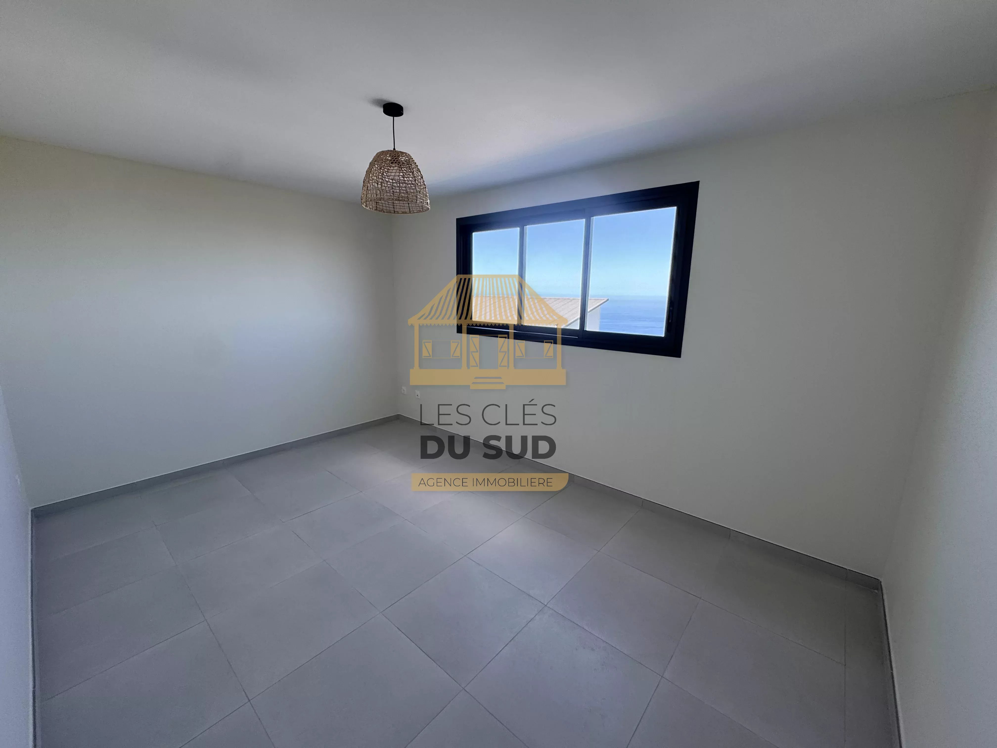 PETITE-ÎLE – MAISON NEUVE 2025 AVEC VUE MER – 3 CHAMBRES ET TERRASSE