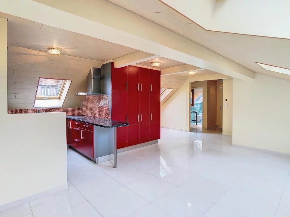 Duplex en attique avec terrasse au centre-ville