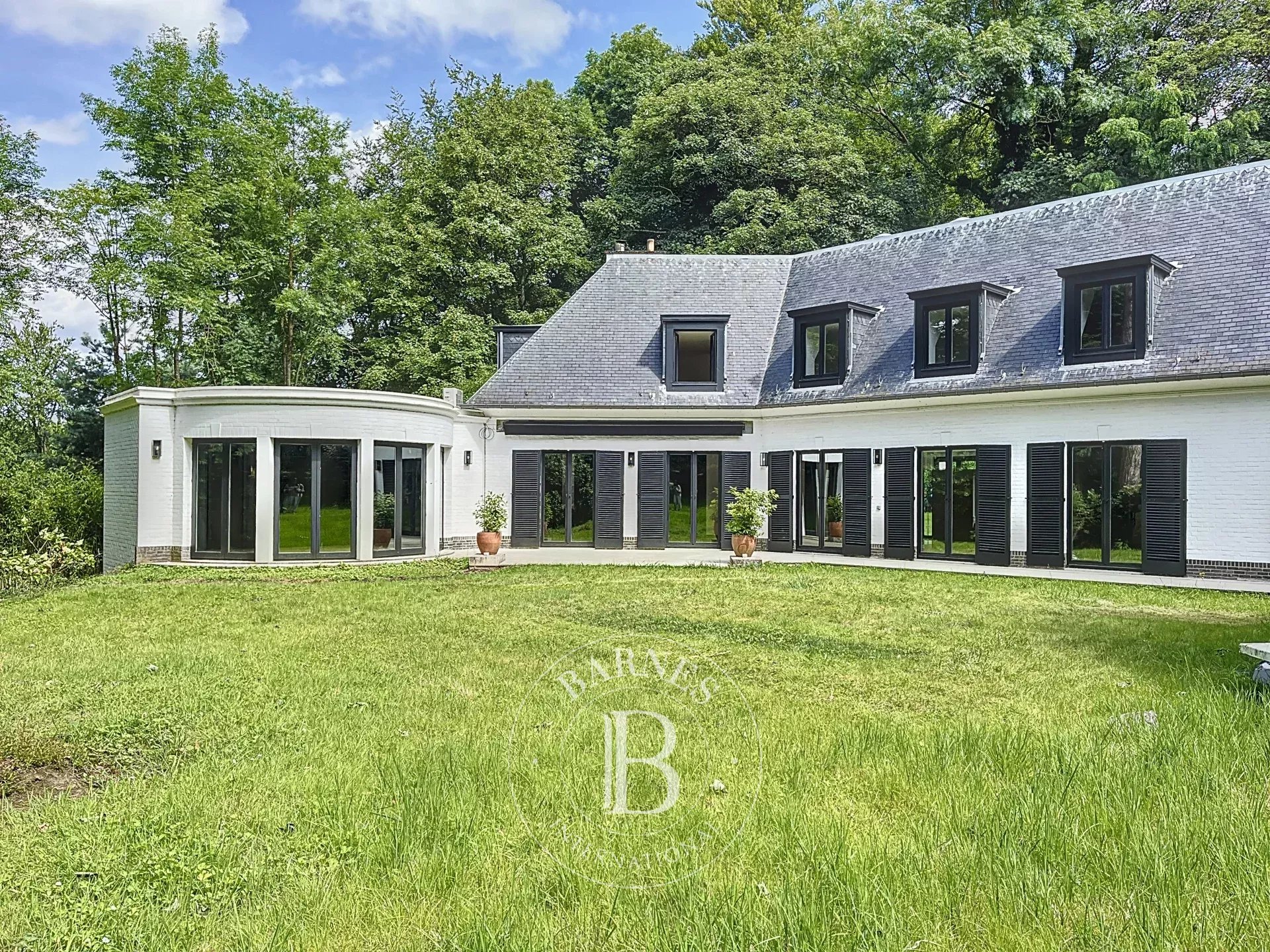 Uccle - Belle villa sur un terrain de fond arboré