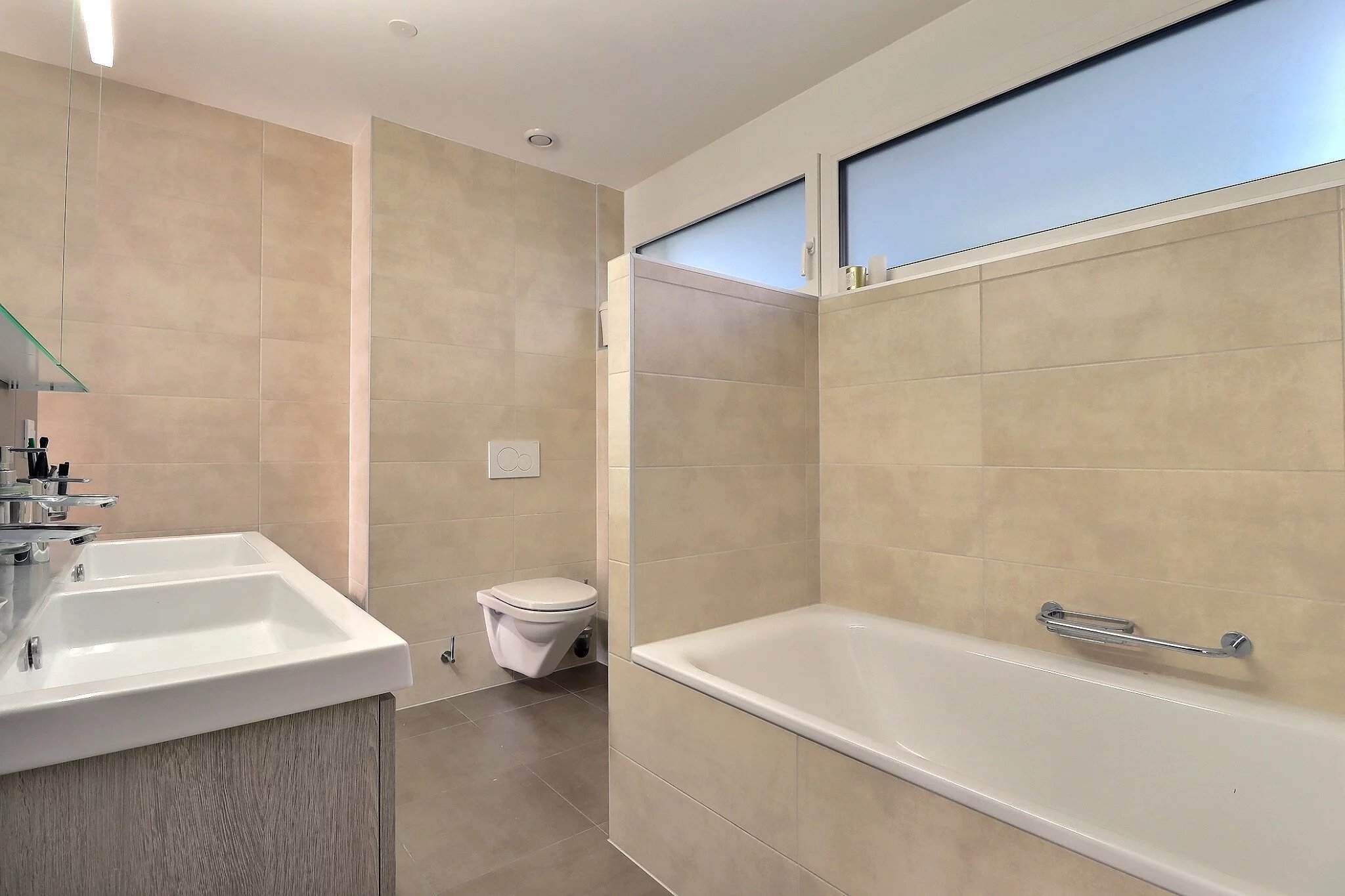 Élégant appartement 5.5 pièces avec jardin et terrasse