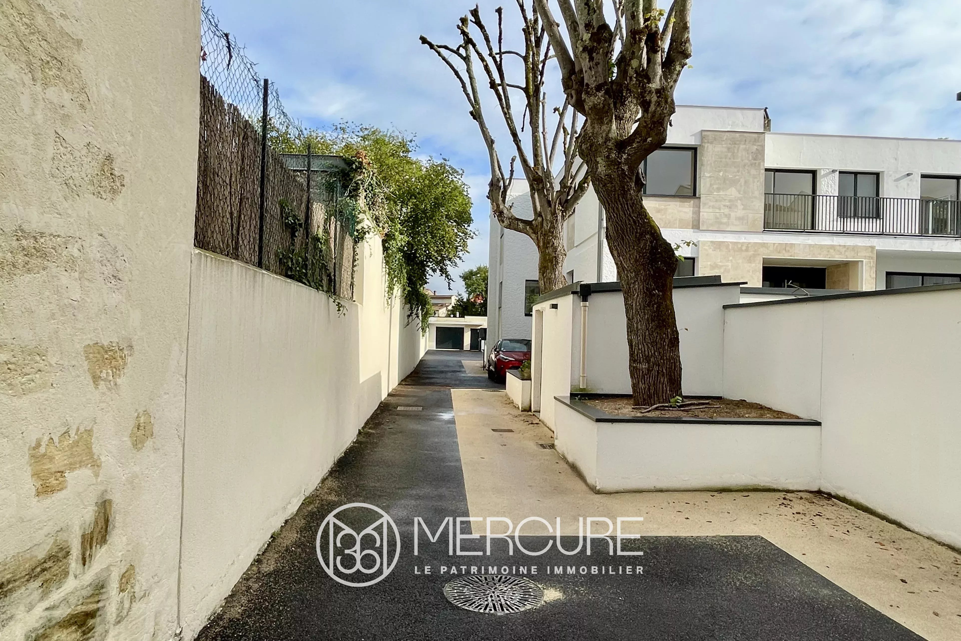 SAINT SEURIN –  GRAND APPARTEMENT AVEC TERRASSES ET PARKING - 900951bxA