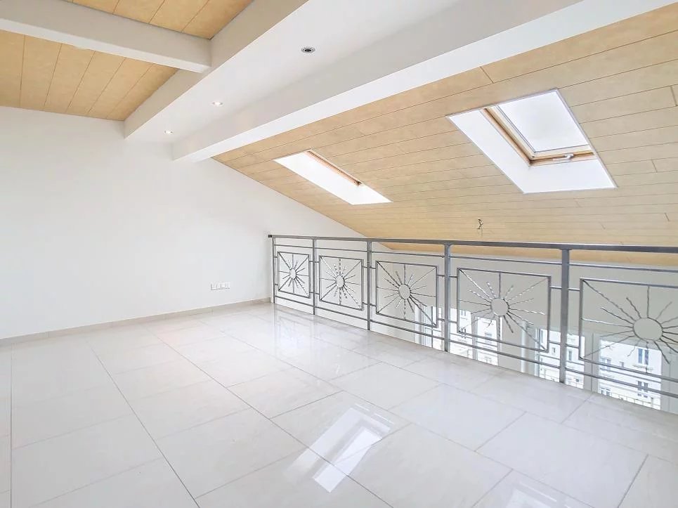Duplex en attique avec terrasse au centre-ville