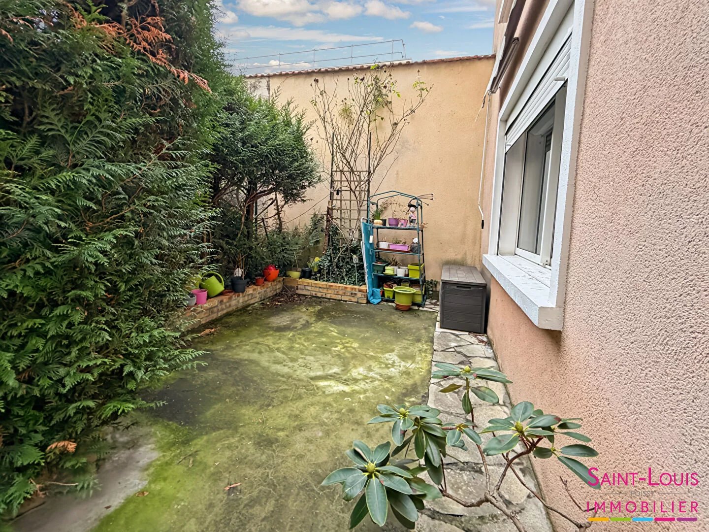 POISSY Centre Maison de ville avec 3 CH et garage.