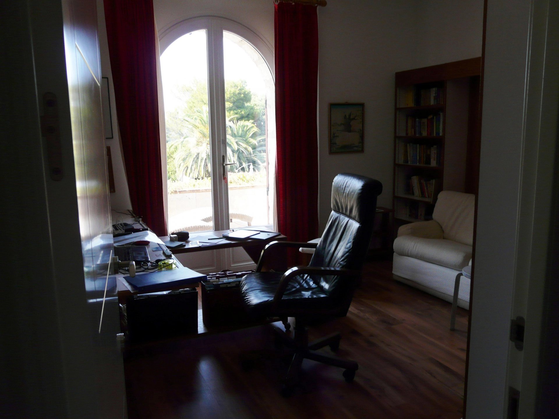 Study of fifth bedroom, natural light, wood floors