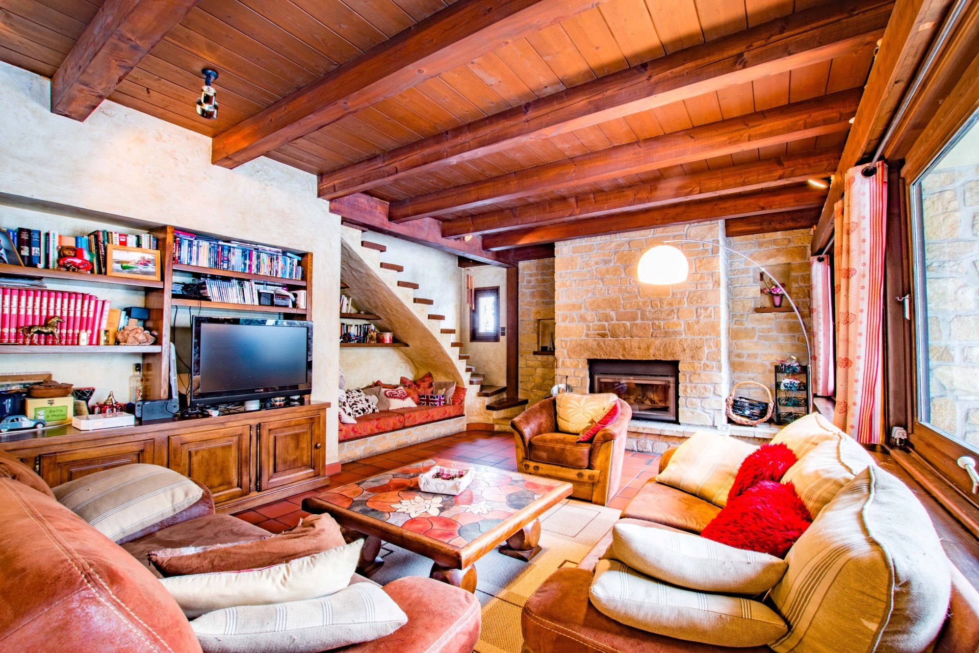 Living-room Exposed bricks Fireplace Wooden floor