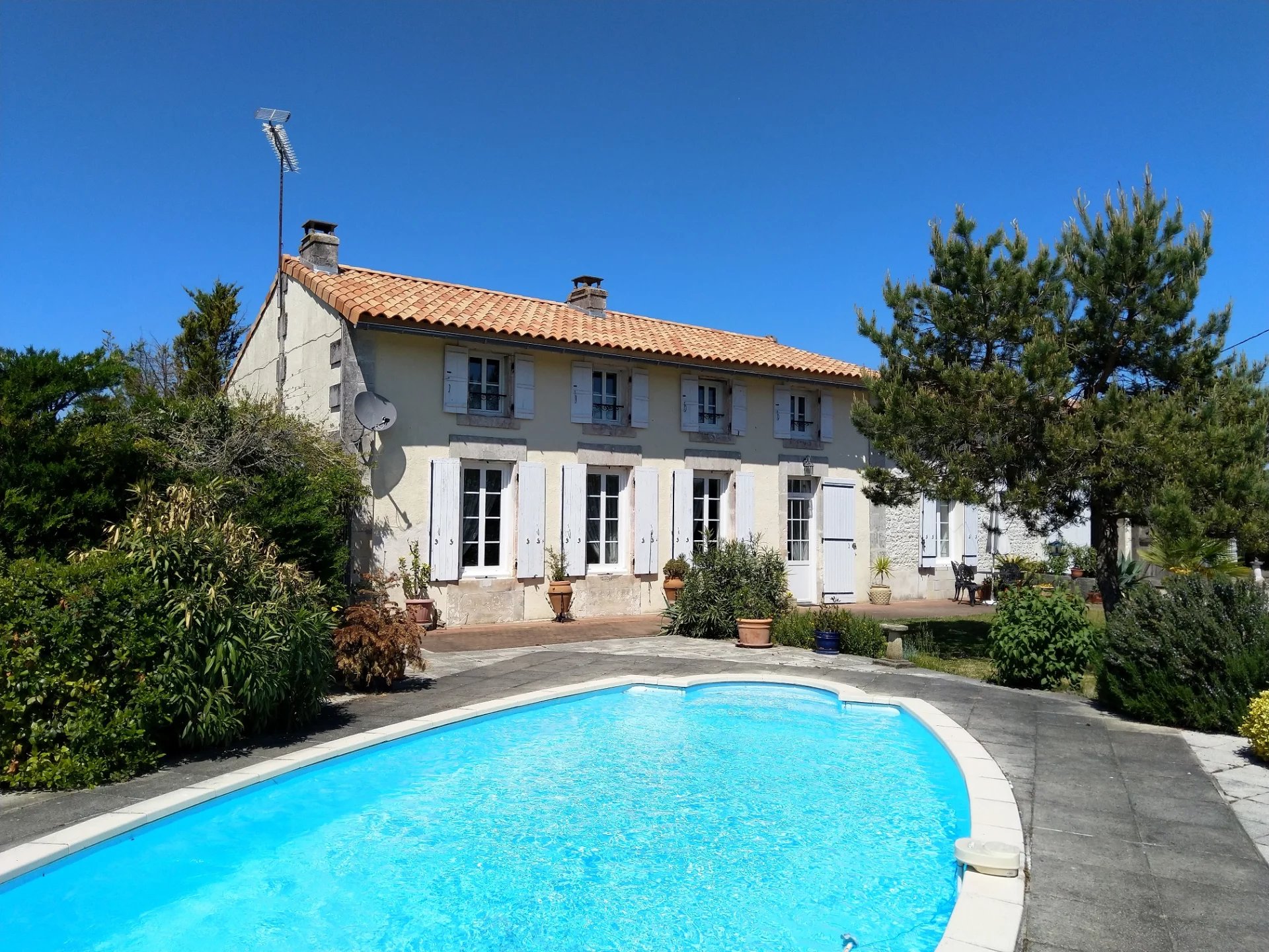 Four bedroom house with gite, pool and land.