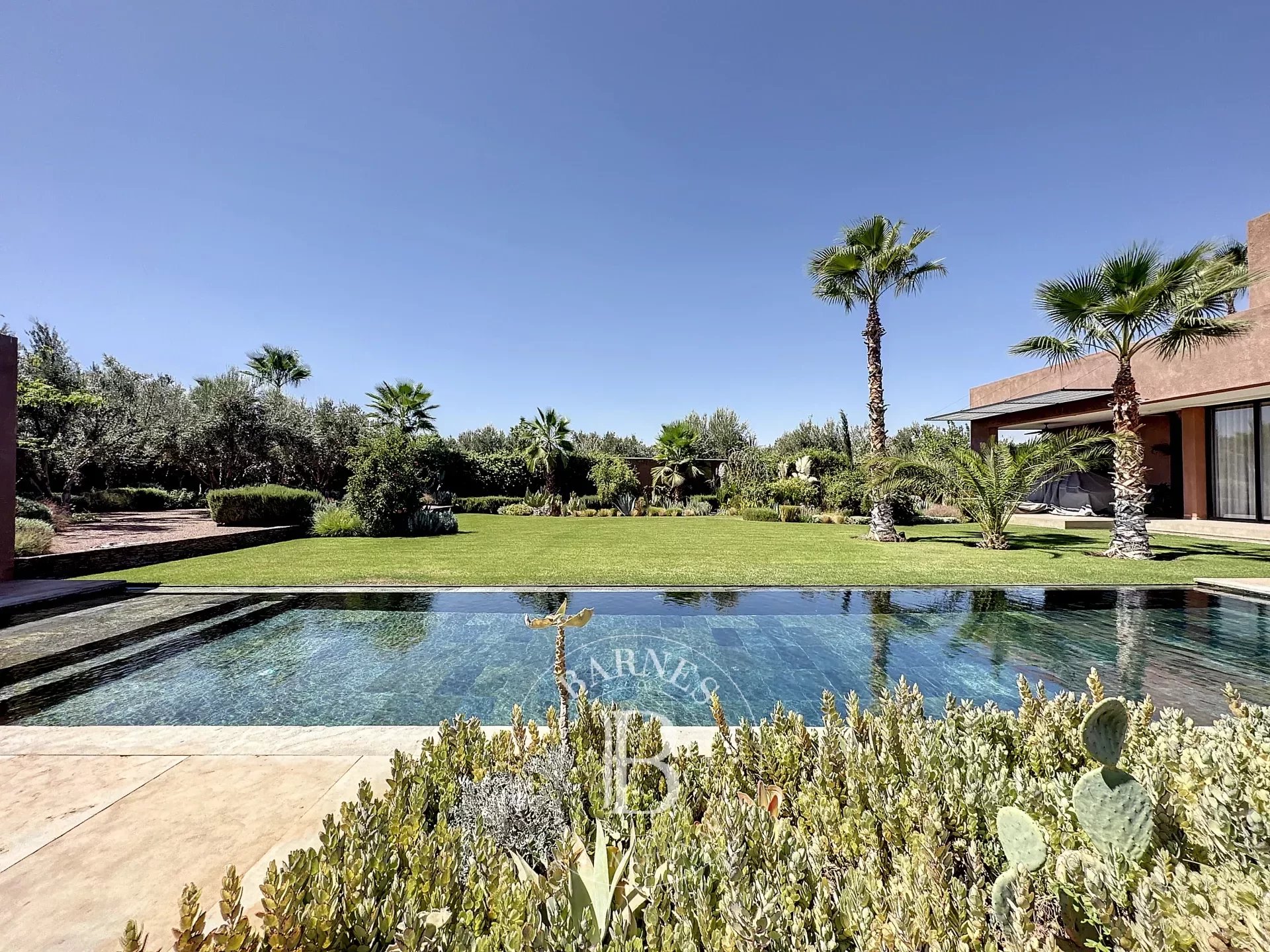 Luxury contemporary villa with infinity pool for sale on the Ourika road in Marrakech.