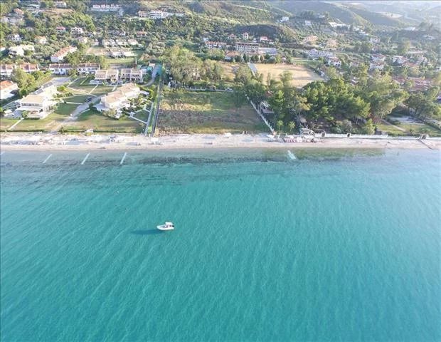 For sale fenced Land 4800 sq.meters in Kassandra, Chalkidiki. The territory has water supply, electricity supply, has building permission. Has a wonderfull sea view. A unique beachfront Land parcel l