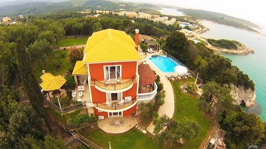 For sale 3-storey villa of 360 sq.meters on the island of Corfu. The semi-basement consists of one bedroom, one bathroom. The ground floor consists of one bedroom, living room with kitchen, one bathr