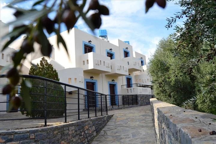 For sale hotel complex "Aparthotel" with total area of 1100 sq.m in Elounda. The complex consists of 29 apartments located in three two-storey buildings with a big swimming pool, pool &amp; snack bar
