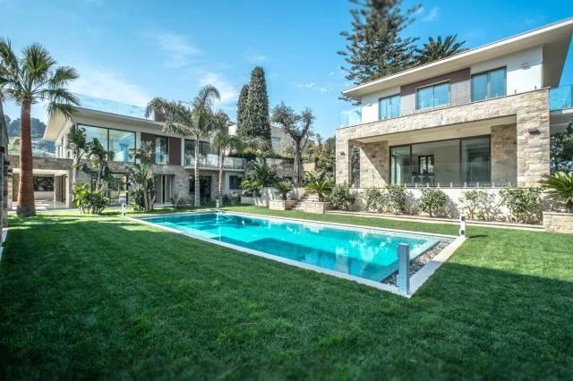 Exclusive estate boasting three luxury modern villas